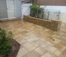 Patio with westone seating wall step